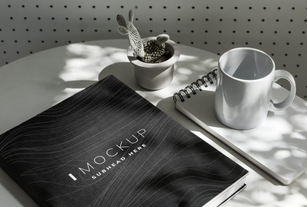 Black textbook cover mockup on a table