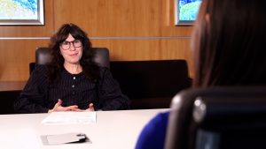Jessica Holzbauer, a licensed clinical social worker with the Huntsman Mental Health Institute shares resources families can use to bridge the treatment gap. (Photo: Josh Szymanik, KSL TV)