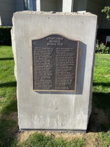 A plaque mentioning the pioneer cemetery and Native American burial ground on the corner of 300 South and 200 West. (Eliza Pace, KSL TV)