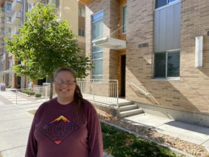 Rachel Quist, an archaeologist, shown in front of the Liberty Crest Apartments in Salt Lake City, the former location of the Scandinavian Methodist Episcopal Church.