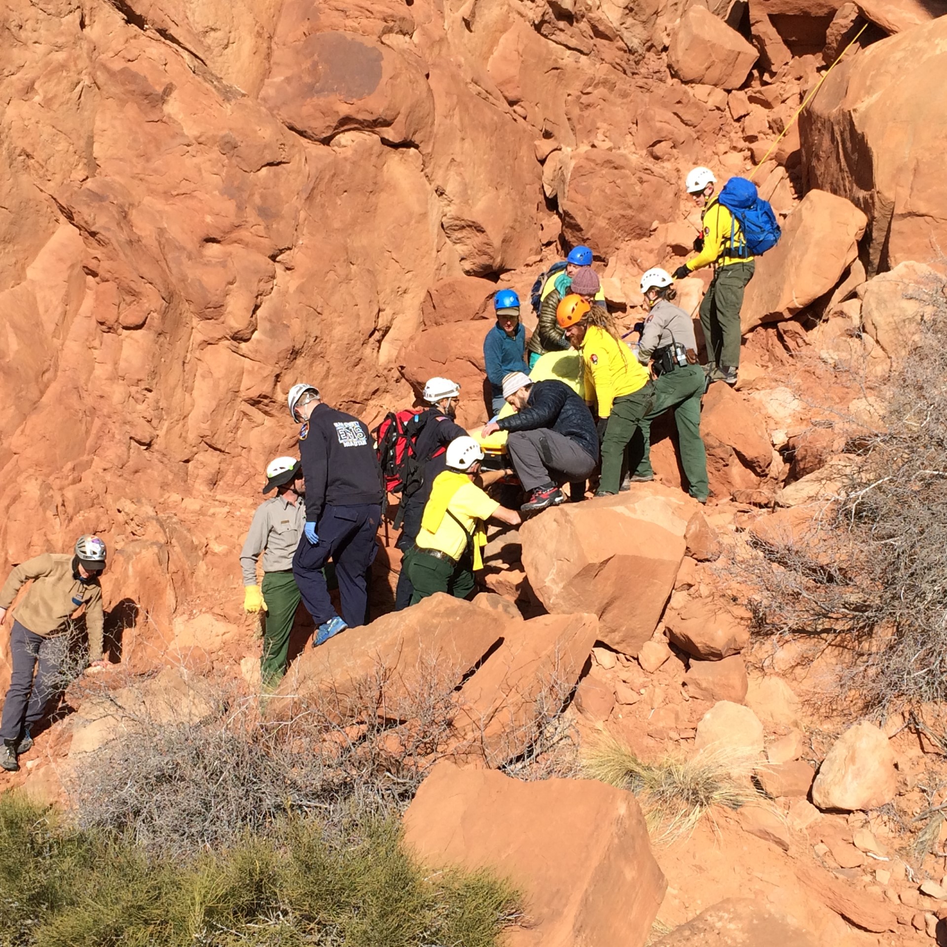Carly Webster is hoisted down by the SAR team during her rescue (Photo courtesy: Carly Webster)
