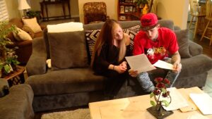 Morisha Quintana (left) and Joshua Johnson (right) review conflicting drug test results in March 2023. (Jeff Dahdah/KSL-TV)
