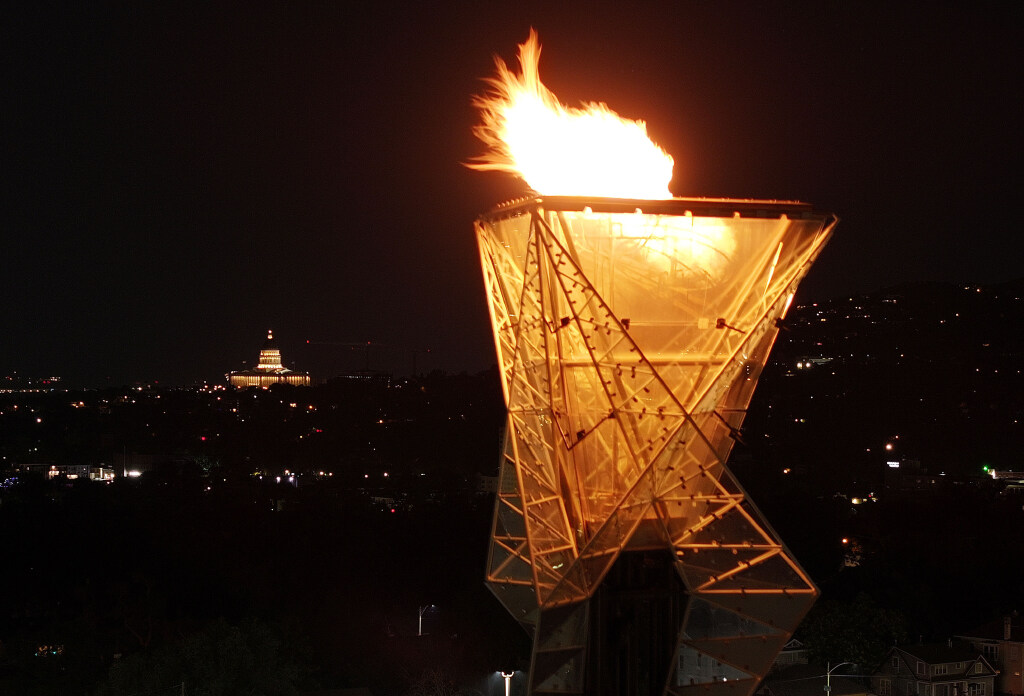 The Olympic Cauldron is lighted during a live watch party for the Salt Lake City-Utah Committee’s 2034 Winter Olympics bid on Wednesday, July 24, 2024, in downtown Salt Lake City. (Jeffrey D. Allred, Deseret News)