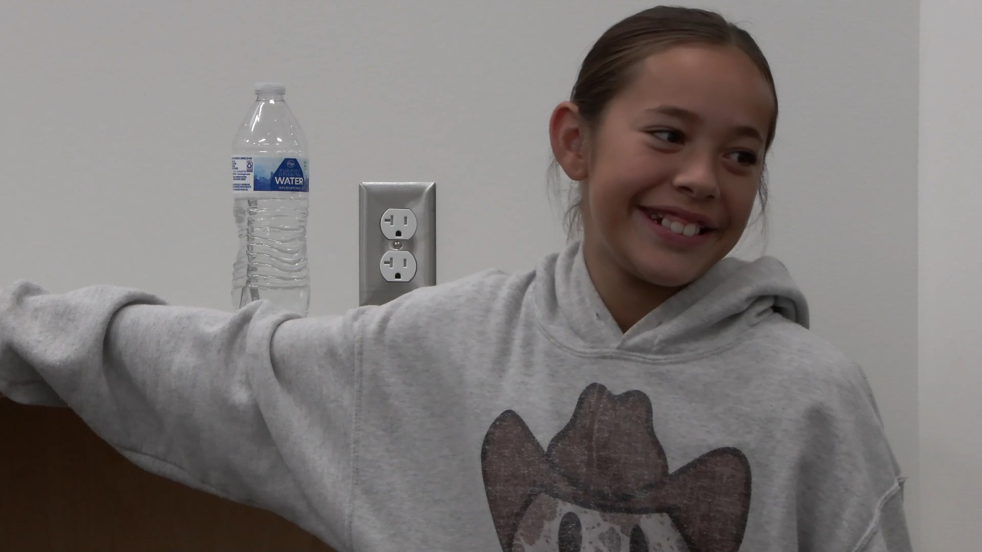 Paongo checking in on the new library she helped to fund. (KSL TV)