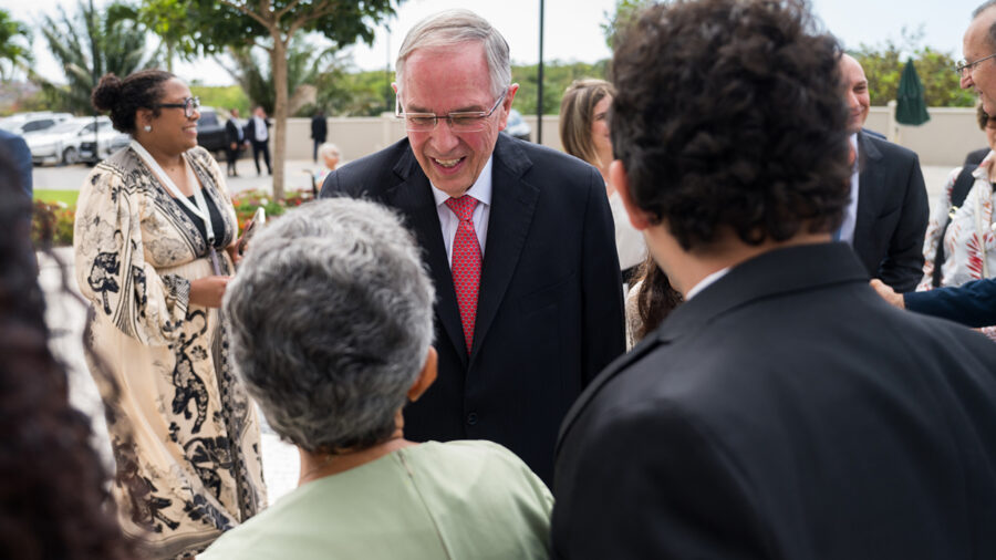 Elder Neil L. Andersen of the Quorum of the Twelve Apostles greets Latter-day Saints waiting to attend the dedication of the Salvador Brazil Temple on Sunday, Oct. 20, 2024. (The Church of Jesus Christ of Latter-day Saints)
