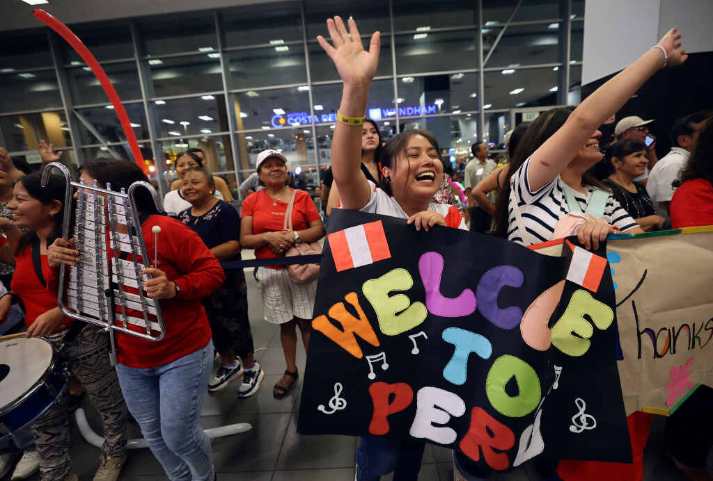 People welcome The Tabernacle Choir and Orchestra at Temple Square at the Jorge Chavez International Airport in Lima, Peru, as the choir and orchestra arrive for the “Songs of Hope” world tour on Tuesday, Feb. 18, 2025. (Kristin Murphy, Deseret News)