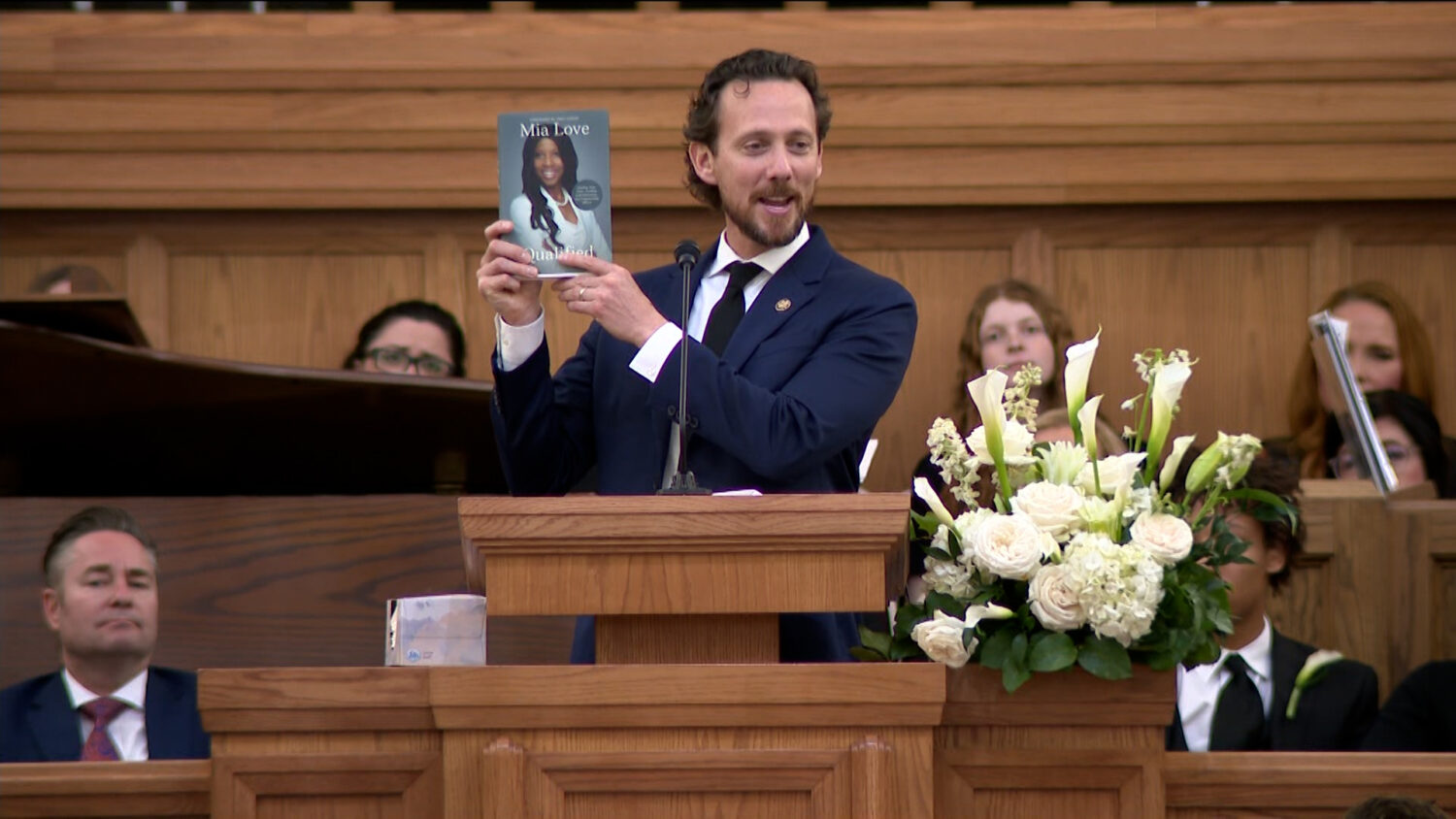 Jason Love speaking about his late wife's book at her funeral on Monday, April 7, 2025. (KSL TV)