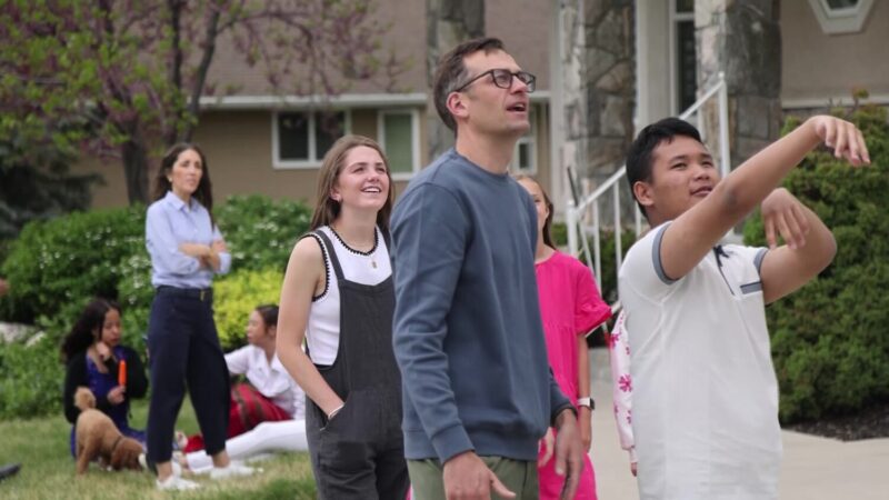 Family friends playing basketball with Sha Reh outside of their front home. (Jack Grim, KSL TV)