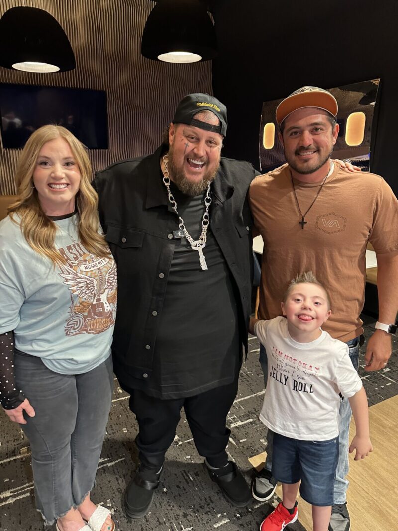 Brandon Barela and his parents meet with Jelly Roll backstage before his August 2024 show at The Delta Center. (Courtesy Barela family)