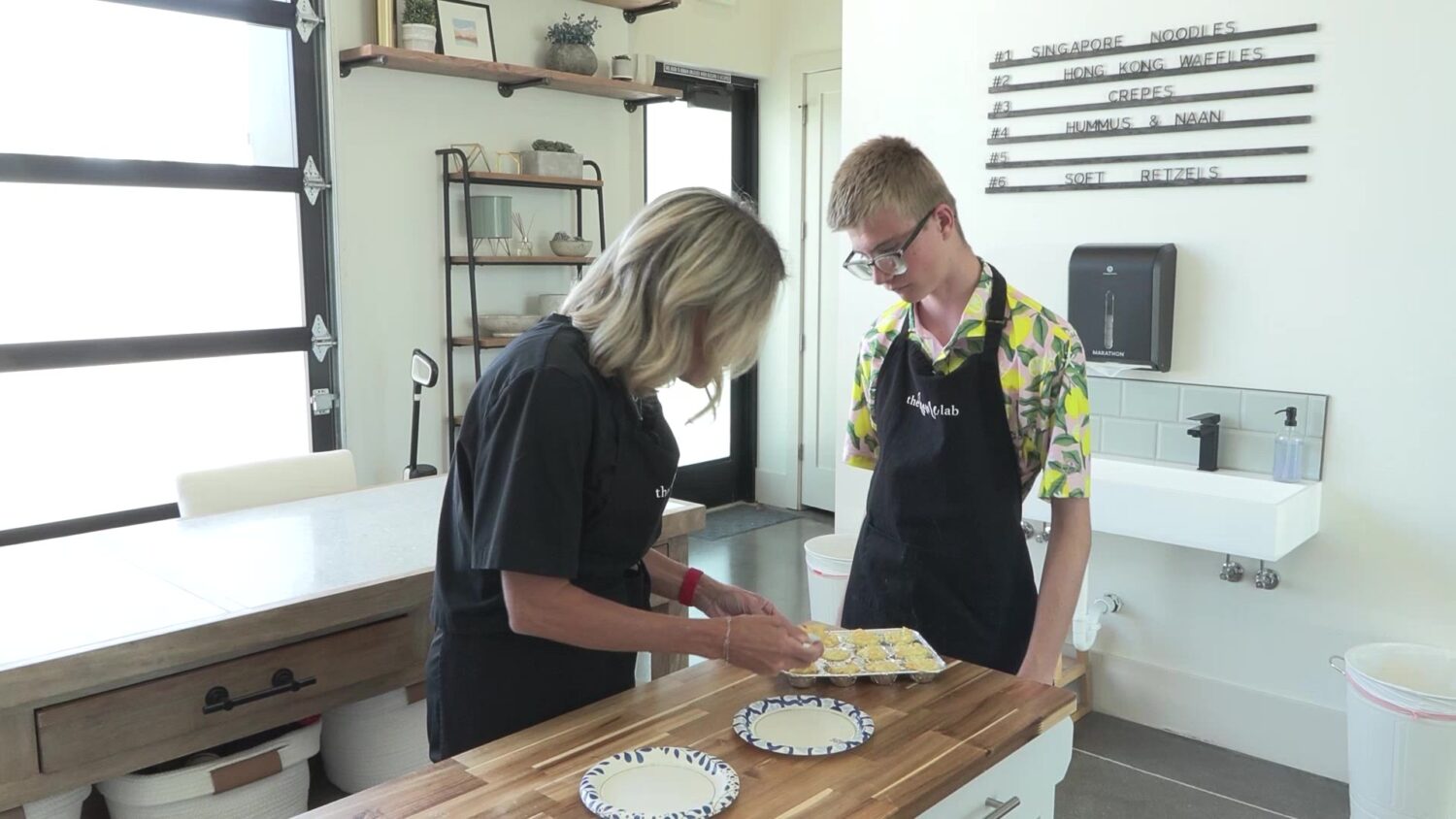 Jade and Stephanie Paulson making mac and cheese bites together. (KSL TV)