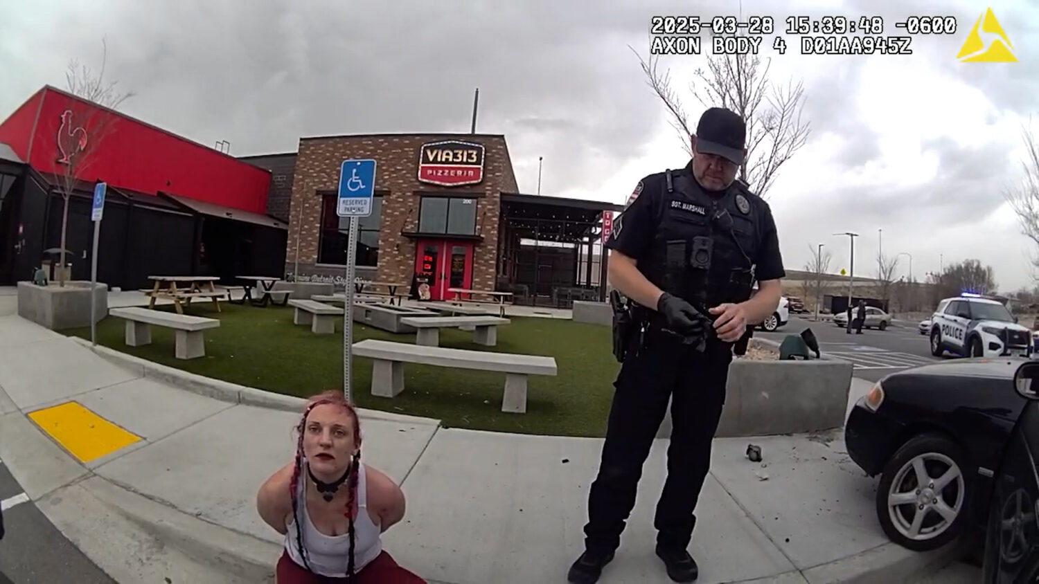 Haley Sullivan in handcuffs as police begin to question her. (The Lehi Police Department)