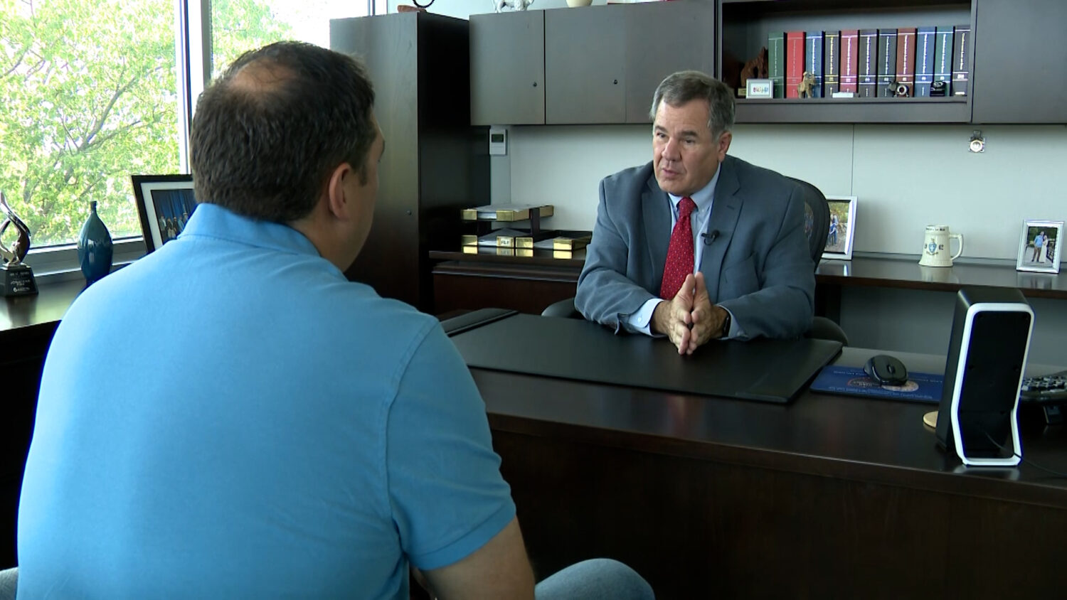 Utah insurance commissioner Jon Pike explains to KSL's Matt Gephardt some of the legal consequences parents can face if they don't add their teen drivers to their insurance. (Stuart Johnson, KSL TV)