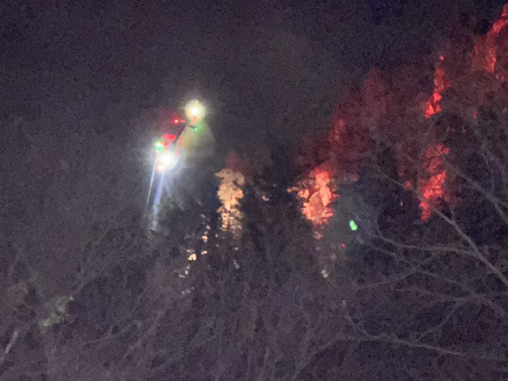 A helicopter preparing to help transport a man who had fallen from a cliff on Oct. 22, 2025. (Andrew Adams, KSL TV)