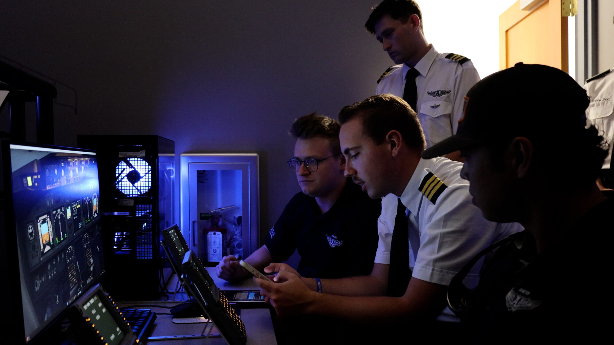 Graduate instructors help students learn how to use navigation instruments at Utah State University. (Jack Grimm, KSL TV)