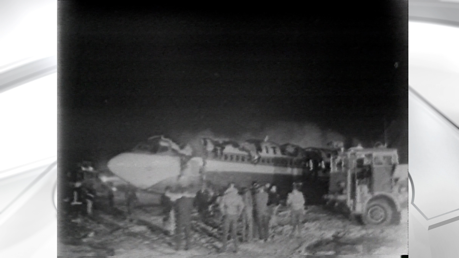 First responders and aviation officials at the crash site of Flight 227 in 1965. (File, KSL TV)