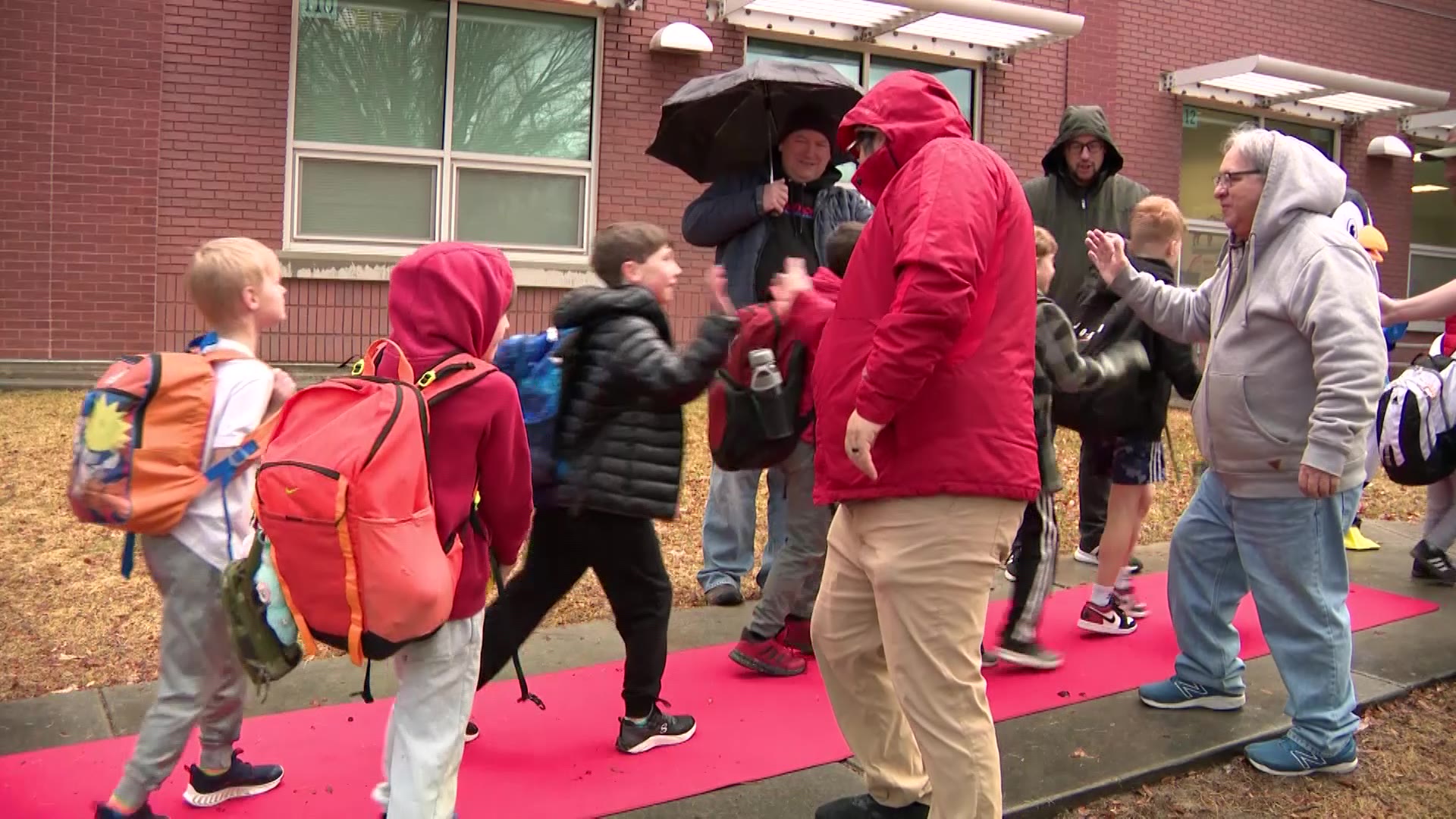 All Pro Dads partnered with William Penn Elementary School to create a morning focused on encouragement and connection. Students were greeted by cheering dads, a rolled-out red carpet and even cups of hot chocolate to start their day. (Derek Peterson, KSL)