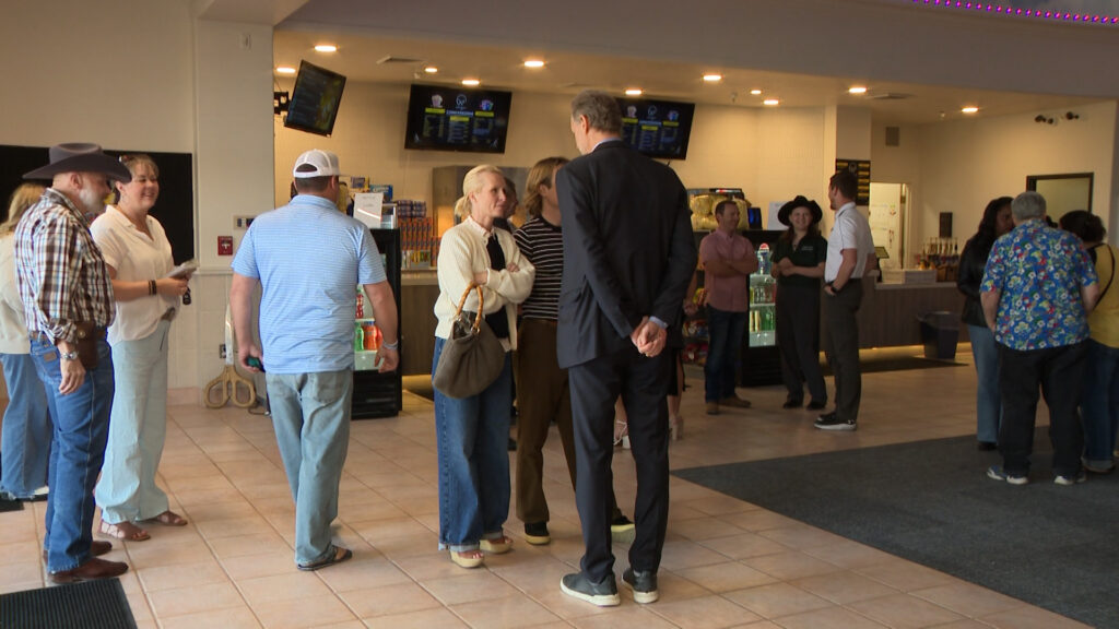 People gather at the grand reopening of Wayfarer Theaters in Payson on Friday, March 27, 2026. (Istvan Bartos, KSL)