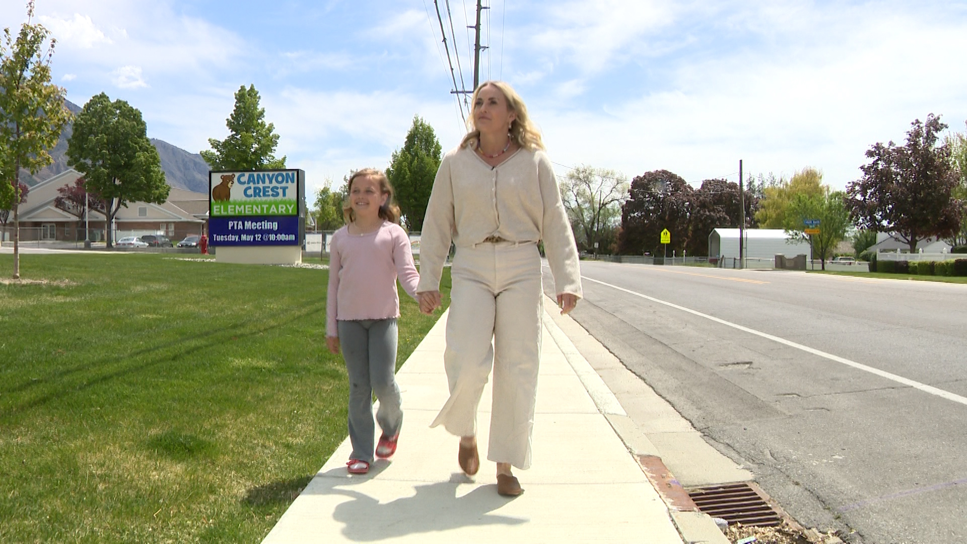 Brenna Borup walks with her daughter near Canyon Crest Elementary School in Provo on Wednesday, April 29, 2026. (Mark Wetzel, KSL)
