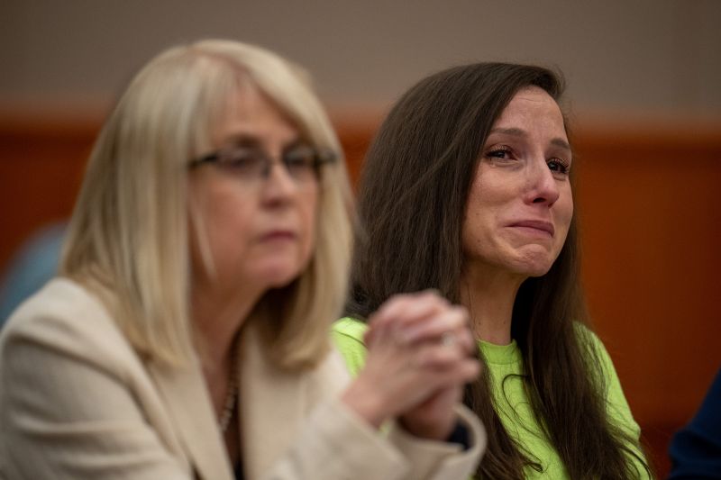 Kouri Richins reacts as her brother, Ronney Darden, speaks on her behalf during her sentencing in 3rd District Court in Park City on Wednesday, May 13, 2026. At left is defense attorney Wendy Lewis. (Pool)