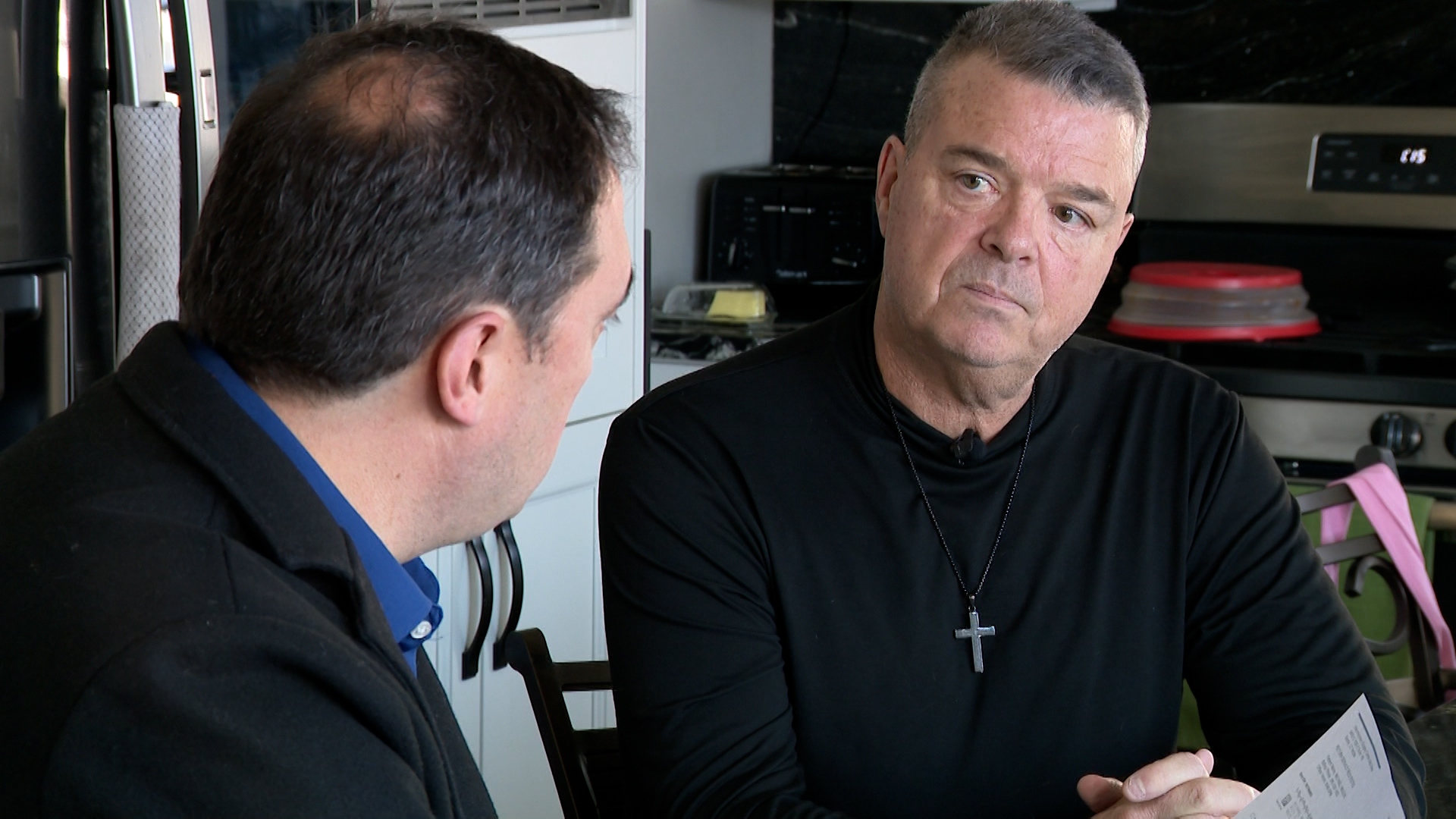 Michael Mason goes over his bill with KSL's Matt Gephardt. (John Wilson, KSL)