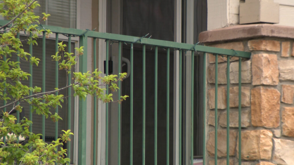 John Santy explained that the suspect swung from a 3rd floor balcony down onto his 2nd floor balcony before entering Santy's apartment through the open slider door. (Istvan Bartos, KSL)