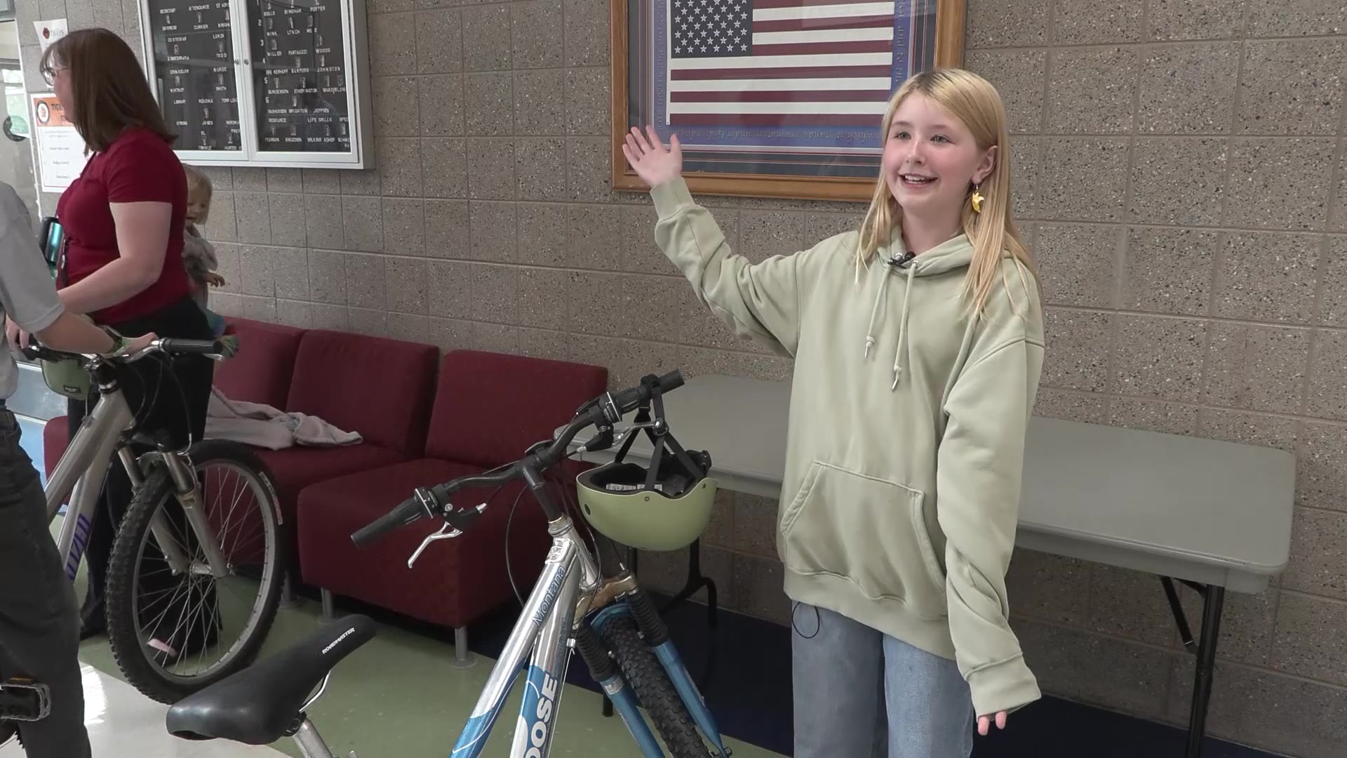 Poppy Merchant is pictured with her new bike. (Mark Wetzel, KSL)